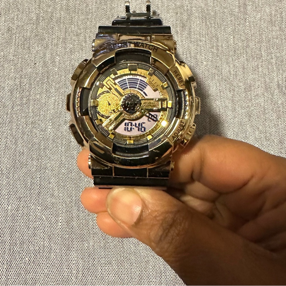 Gold and Black Digital Watch